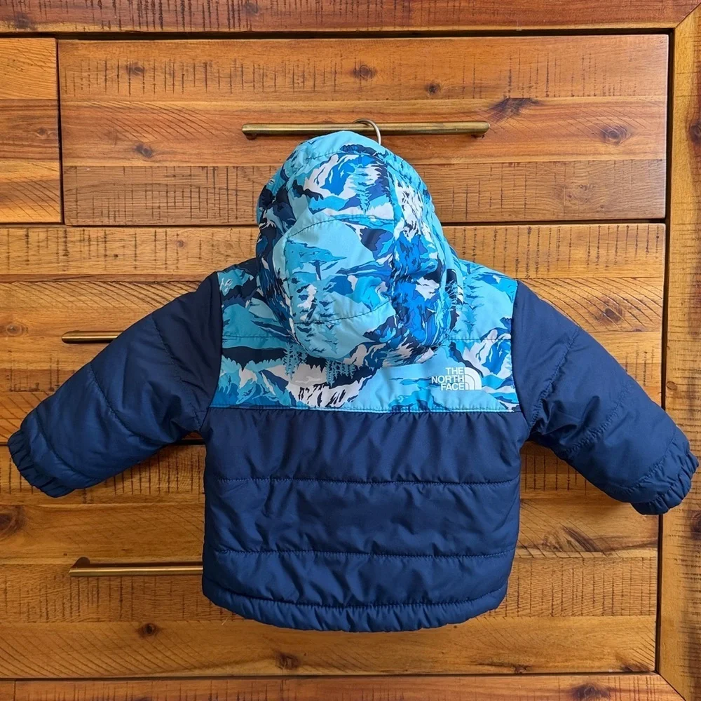 The North Face Blue and White Baby Puffer Reversible Jacket